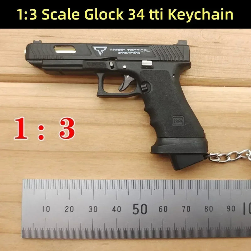 2024 1:3 G17 G17 G34 TTI Taran Tactical Alloy Empire PUBG Mini Pistol Keychain Toy Gun Fidget Toy Shell Ejection Free Assembly